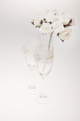 Bouquets and glasses on a white background