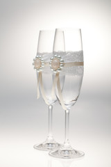 Glasses for a wedding on a gray background