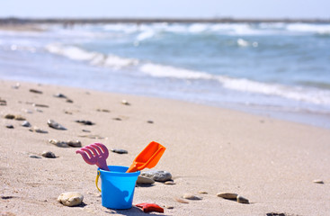 Plastic bucket on the beach