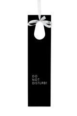 Do not disturb hotel door label on ribbon with text