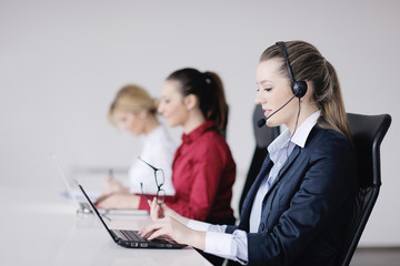 business woman group with headphones