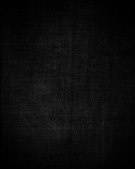 Fototapeta na wymiar Czarny ciemny płótno tła lub tekstury