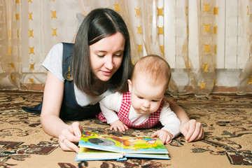 Mother reading to daughter