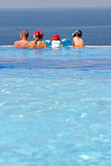 Family in the swimming pool