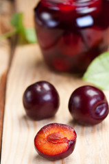 Plums on boards.