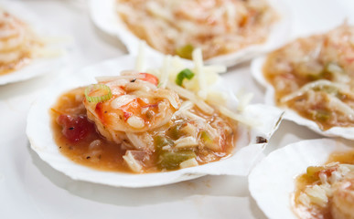 seafood mix in an oyster shell