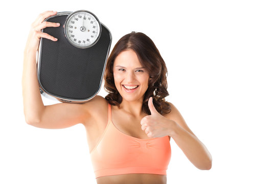 Young woman with measuring scale