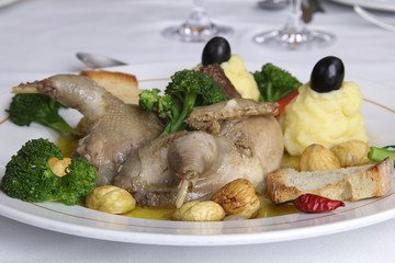 Restaurant dish - partridge stuffed with chestnuts