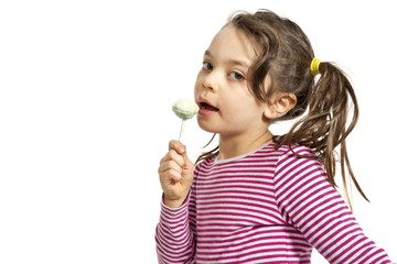 portrait of little girl with a lollipop on white background