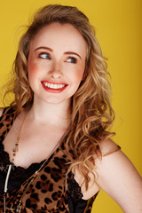 smiling woman wearing top with leopard prints