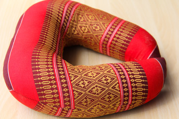 The neck pillow stitched by hand.