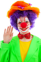 portrait of child dressed as colorful funny clown