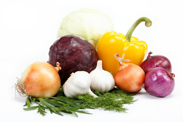 Healthy food. Fresh vegetables and salad on a white background.