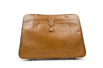 Travel concept with suitcase on white