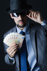 Man with counterfeir money