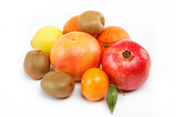 pomegranates and citrus fruits isolated on a white background.