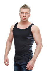Obraz premium One handsome Caucasian musculan man in black t-shirt on white
