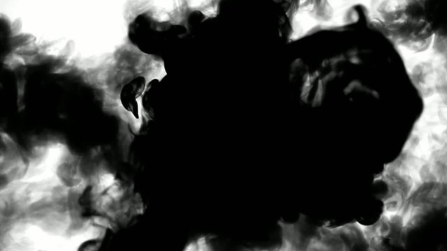 Ink drops forming cloud formations on white. Luma Matte