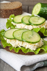Healthy sandwich with cucumber and egg with cheese for breakfast