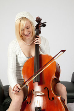 Blond Girl Playing Chello