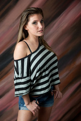 Fototapeta premium brunette girl looking thoughtful at the camera