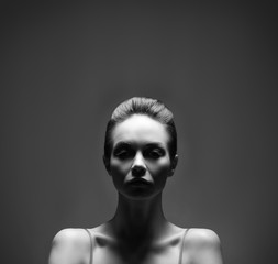 Portrait of a young and serious Caicasian  woman