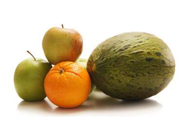 A pile of fresh and tasty fruits isolated on a white background