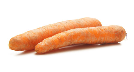 Two fresh and tasty carrots on a white background