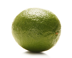 A fresh green lime isolated on a white background