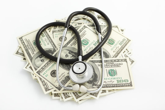 Stethoscope over dollar