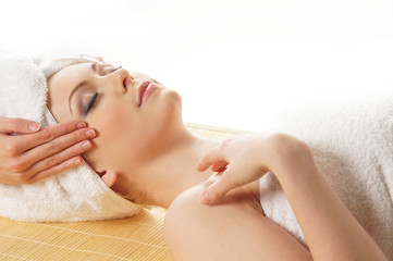 Portrait of a young  woman on a spa procedure