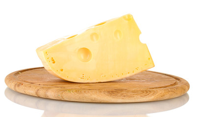 Сheese on wooden board isolated on white