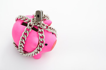 Chained piggy bank