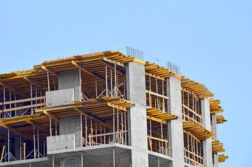 Building  construction site against blue sky