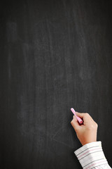 hand writing by red chalk on a blackboard