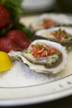Oysters with strawberry mignonette vinaigrette on ice