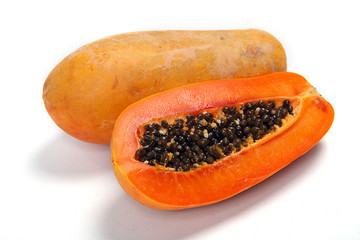 Cut papaya showing the seeds within