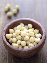 close up of a bowl of hazelnuts