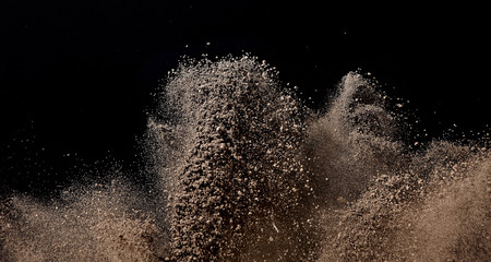 Sand which flies and bounds