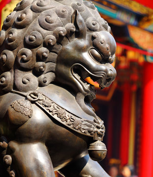 Bronze lion in chinese temple