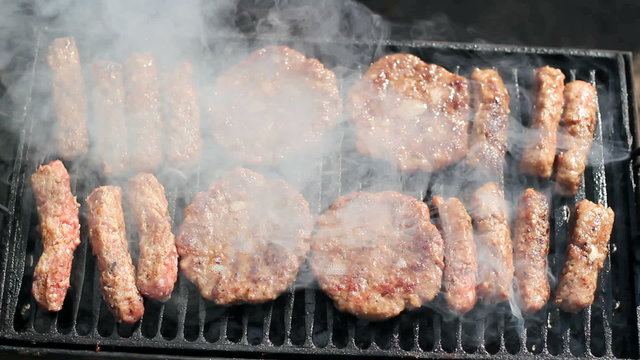 Burgers And Kebabs On Barbecue Grill