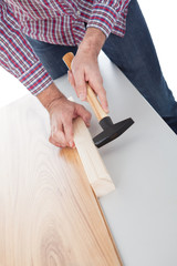 Worker assembling laminate floor
