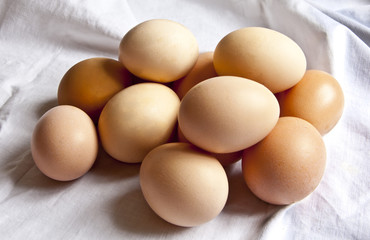 Eggs on white drapery