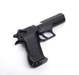 Loaded gun isolated on white background