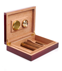 Opened humidor with cigars isolated on white background