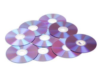 Many cd's disks isolated on white background