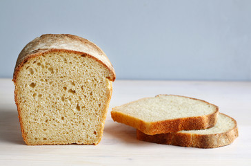 Homemade cornbread sliced on a wooden table for breakfast