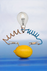 lemon and lamp on white background