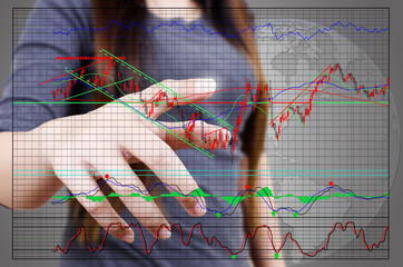 Business lady pushing finance graph for trade stock market.