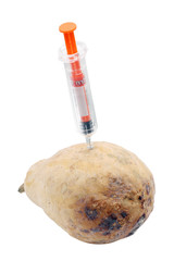 Syringe with old pear.